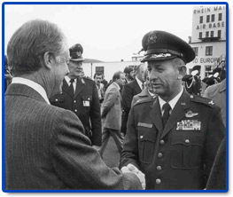 Col. Robert D. Springer greets President Carter
